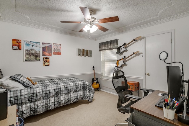 carpeted bedroom featuring a textured ceiling, ceiling fan, and crown molding