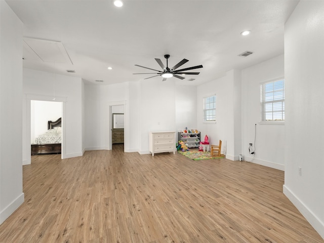 game room with ceiling fan and light hardwood / wood-style flooring