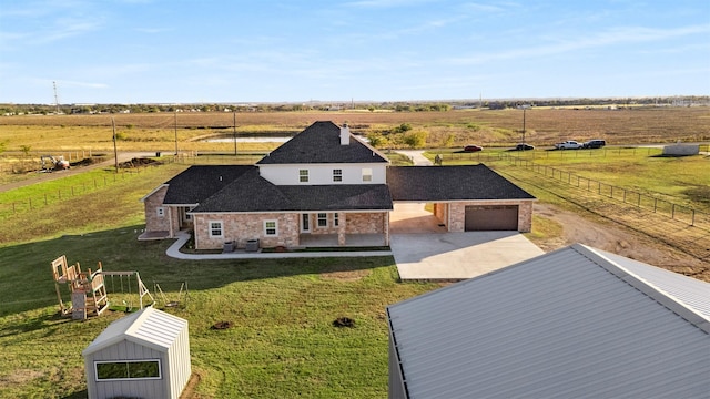 drone / aerial view with a rural view