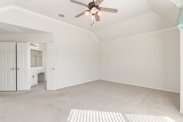 bonus room featuring ceiling fan, light colored carpet, and lofted ceiling