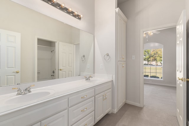 bathroom featuring shower / bathing tub combination and vanity