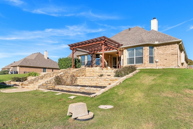 rear view of property featuring a lawn and a pergola