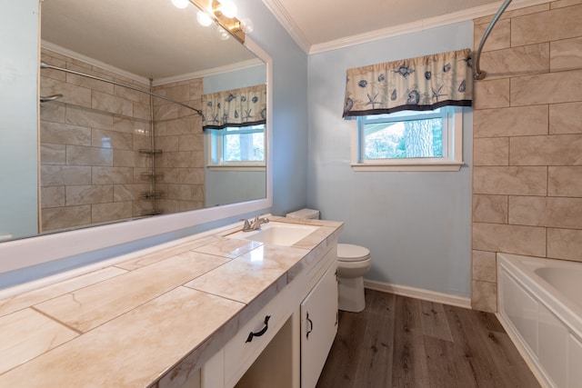 full bath featuring toilet, wood finished floors, vanity, baseboards, and ornamental molding