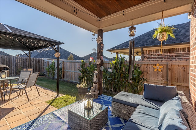 view of patio / terrace featuring a gazebo and an outdoor living space