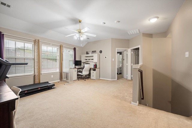 carpeted office space with ceiling fan