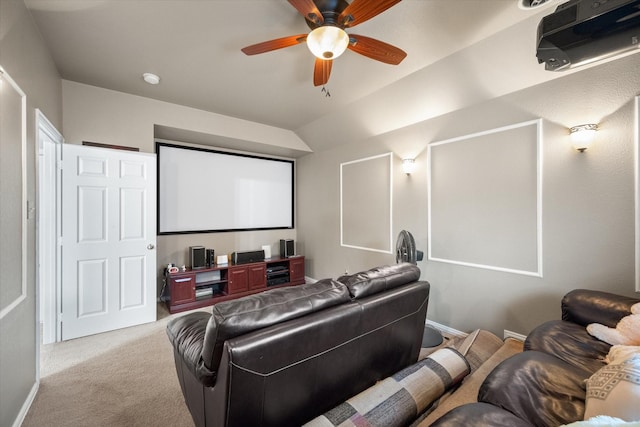 home theater with light carpet and ceiling fan