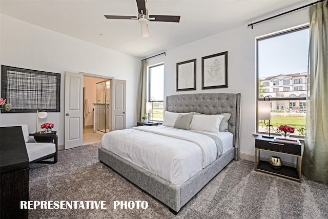 carpeted bedroom with connected bathroom and ceiling fan