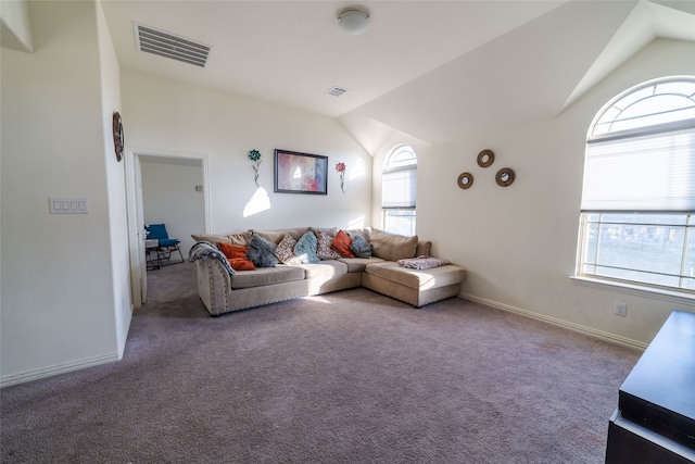 living room with carpet floors and vaulted ceiling