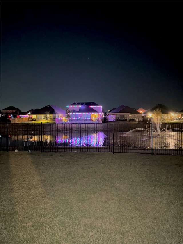 view of yard at night