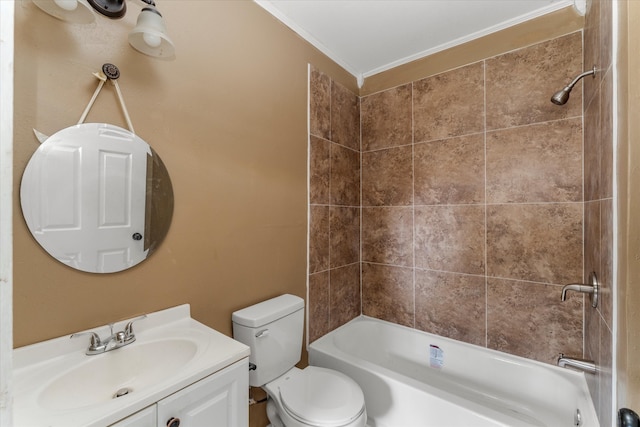 full bathroom with toilet, vanity, tiled shower / bath combo, and ornamental molding