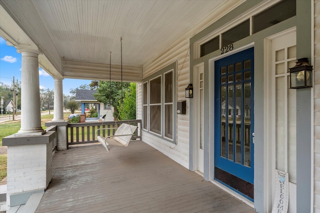 deck featuring covered porch