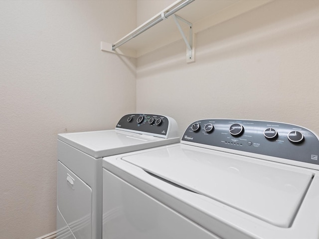 laundry area with washer and clothes dryer