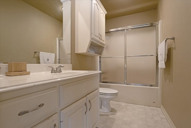 full bathroom featuring vanity, toilet, and enclosed tub / shower combo