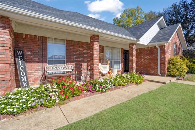 entrance to property with covered porch