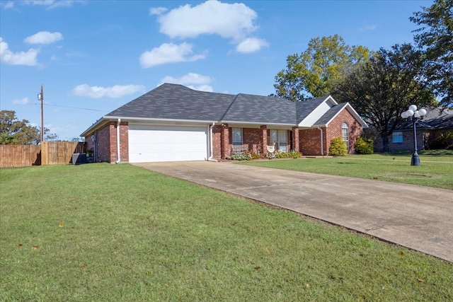 single story home featuring a front yard and a garage