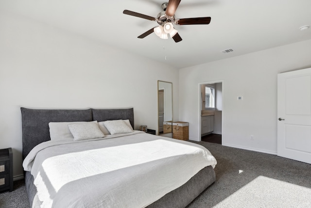 carpeted bedroom with ceiling fan and connected bathroom