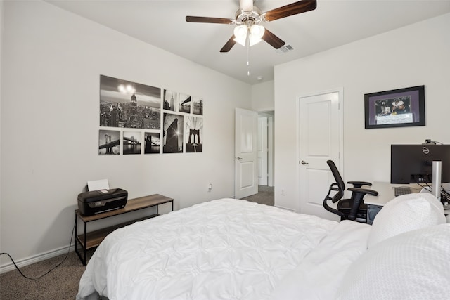 bedroom with ceiling fan and carpet