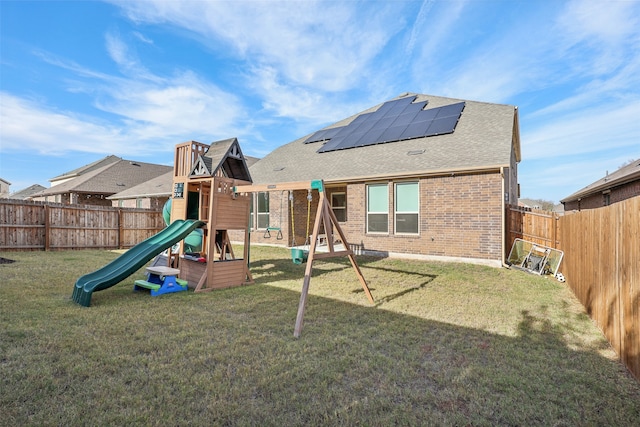 view of playground featuring a yard