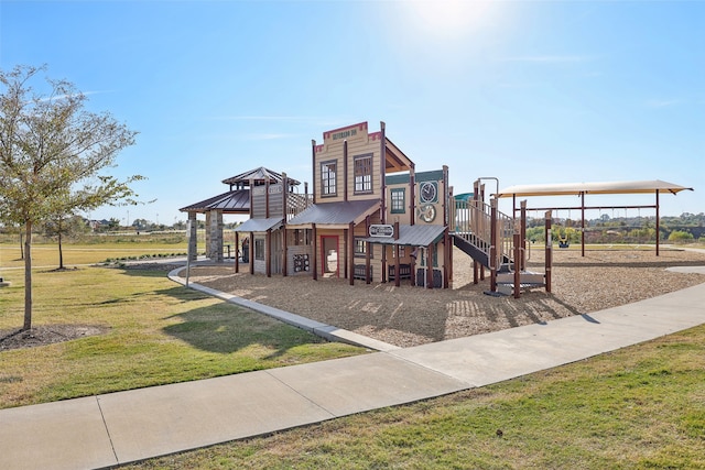 view of playground featuring a lawn