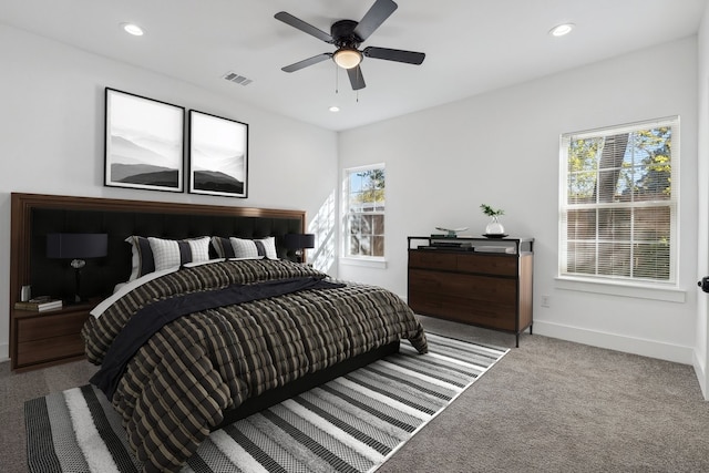 carpeted bedroom with ceiling fan