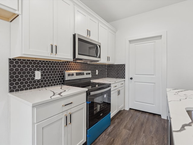 kitchen with tasteful backsplash, light stone counters, black electric range, dark hardwood / wood-style floors, and white cabinetry