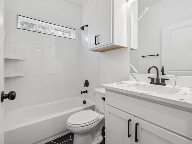 full bathroom with tile patterned floors, vanity, bathtub / shower combination, and toilet