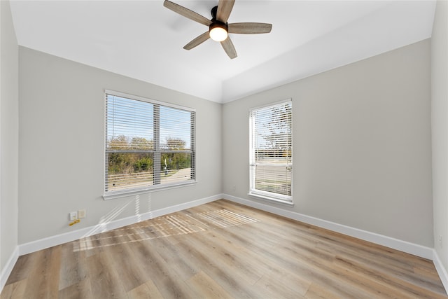 empty room featuring ceiling fan and light hardwood / wood-style flooring