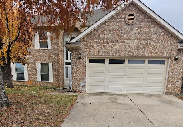 front of property with a garage