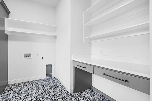 laundry room with hookup for an electric dryer, washer hookup, and light tile patterned floors