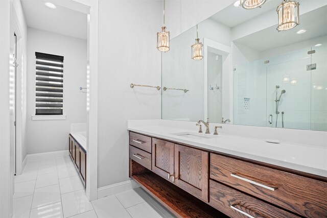 bathroom with tile patterned flooring, vanity, and a shower with shower door