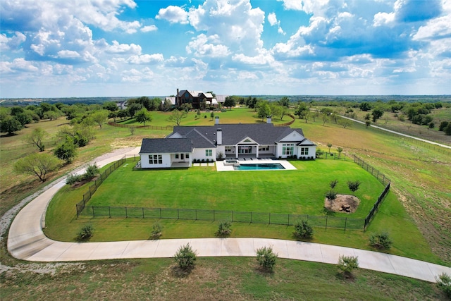 birds eye view of property featuring a rural view