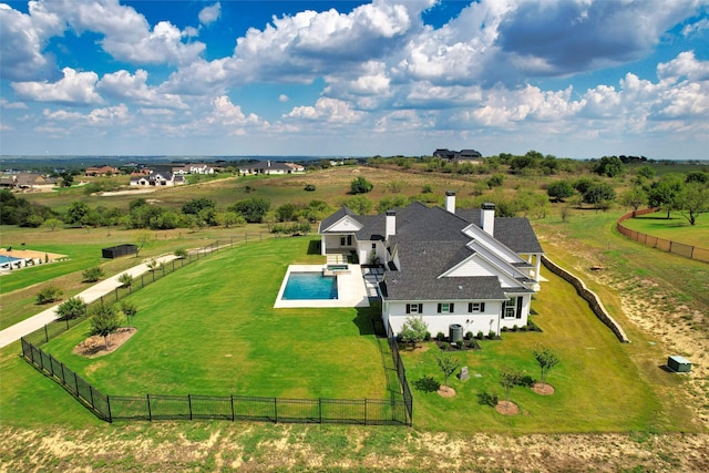 birds eye view of property featuring a rural view