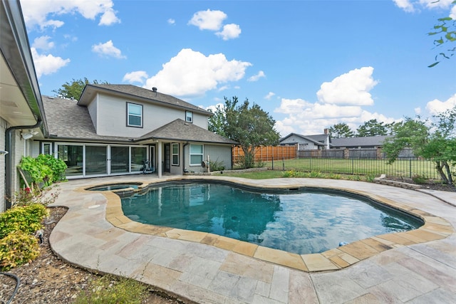 view of pool featuring an in ground hot tub and a patio area