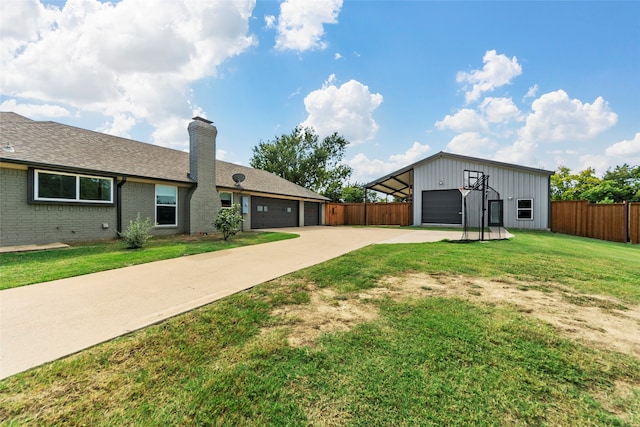 view of front of house with a garage and a front yard