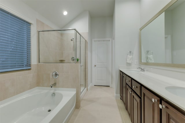 bathroom featuring tile patterned floors, vanity, and independent shower and bath