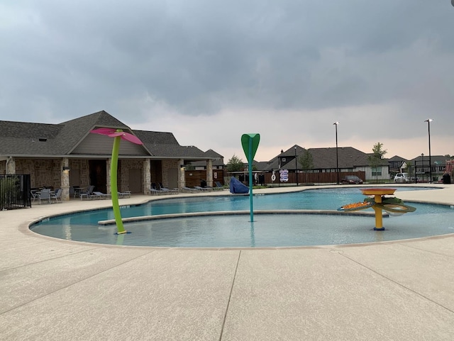 view of pool featuring a patio area