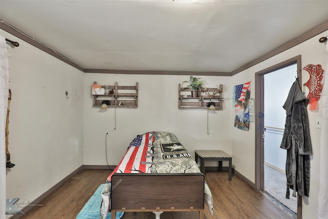 bedroom featuring dark hardwood / wood-style floors