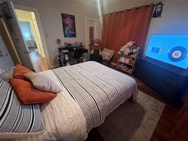 bedroom featuring hardwood / wood-style flooring