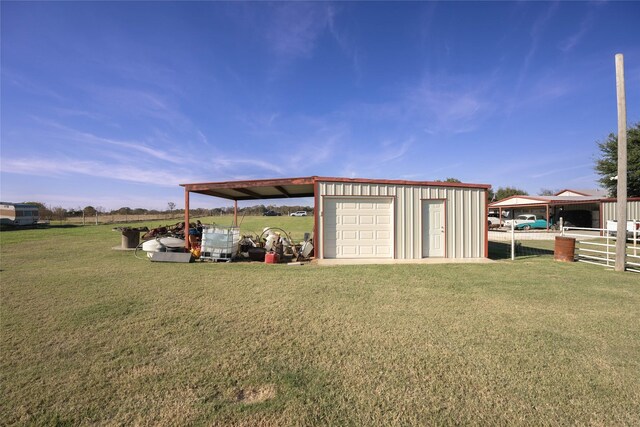 exterior space featuring an outbuilding and a garage