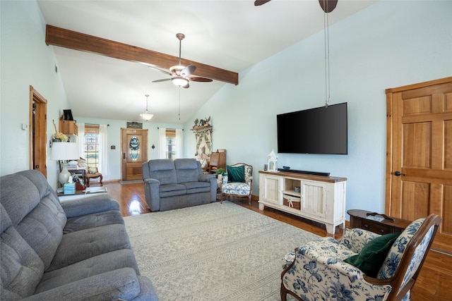 living room featuring vaulted ceiling with beams, dark hardwood / wood-style floors, and ceiling fan