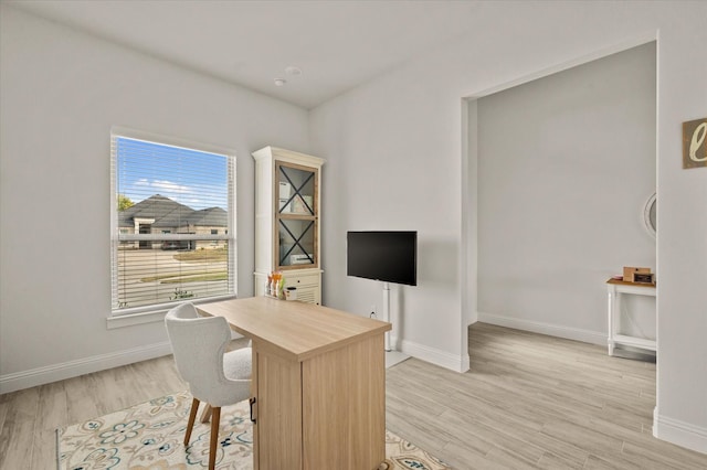 home office featuring light hardwood / wood-style floors