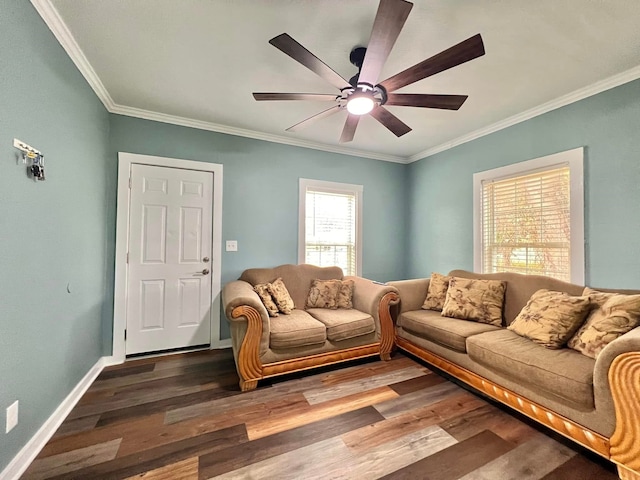 living room featuring hardwood / wood-style floors, ceiling fan, and ornamental molding