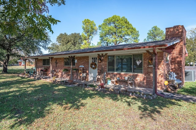 ranch-style home with a front lawn