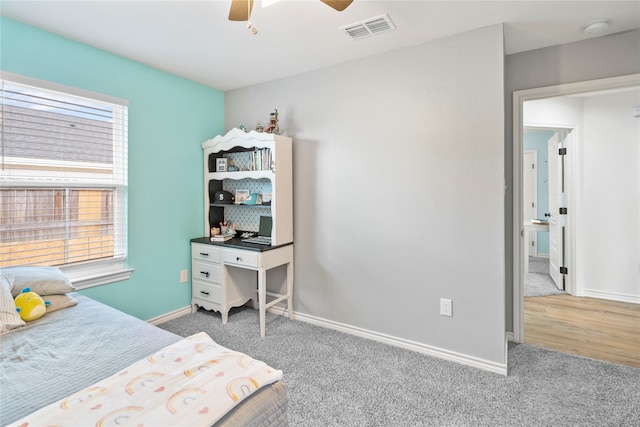 bedroom with ceiling fan and carpet