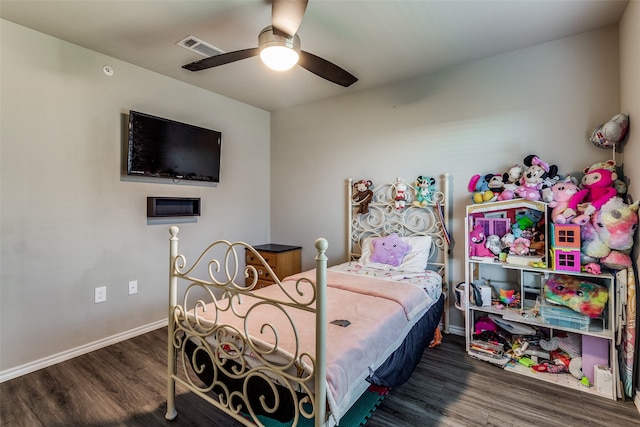 bedroom featuring ceiling fan and dark wood-type flooring