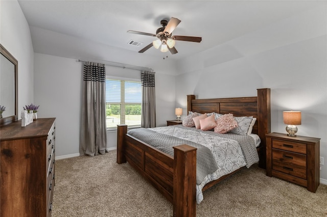 bedroom with light carpet and ceiling fan