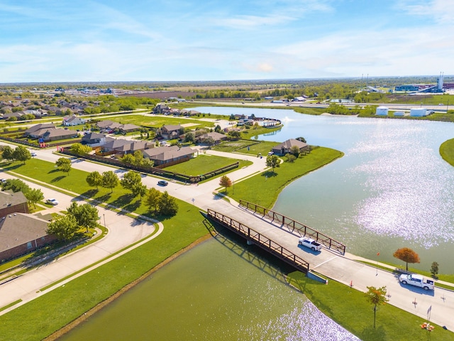 drone / aerial view with a water view