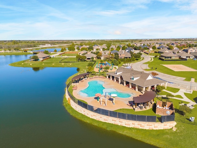 drone / aerial view with a water view