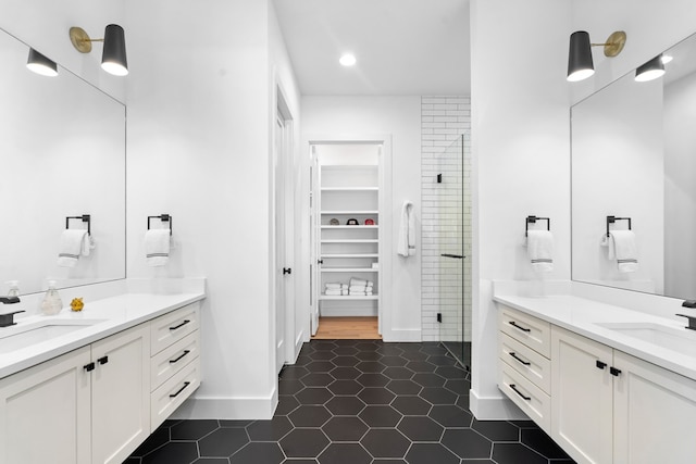 bathroom with vanity, tile patterned floors, and an enclosed shower