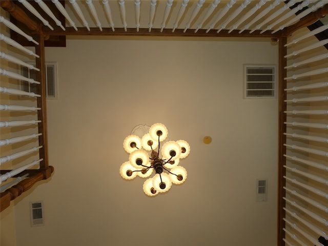 interior details with a chandelier